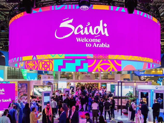Crowds at Saudi Arabia exhibition booth with convention and trade show transportation services for visitors